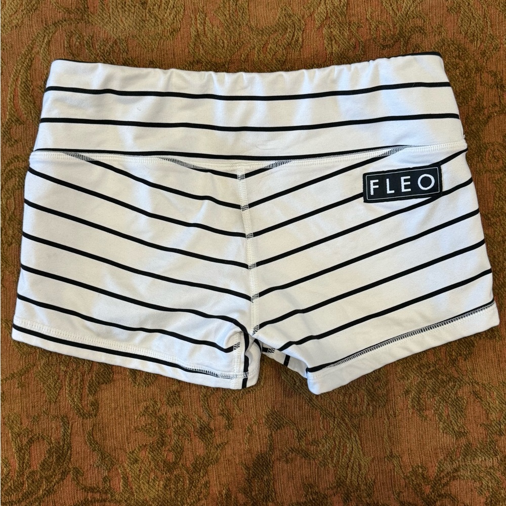 White and black pinstripe Fleo workout shorts. Size small.